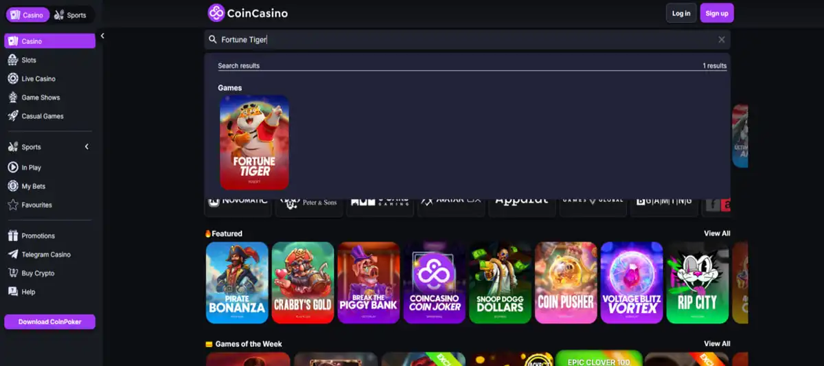 Coin Casino homepage with search bar highlighting the Fortune Tiger slot by PG Soft Coin Casino homepage with search bar highlighting the Fortune Tiger slot by PG Soft